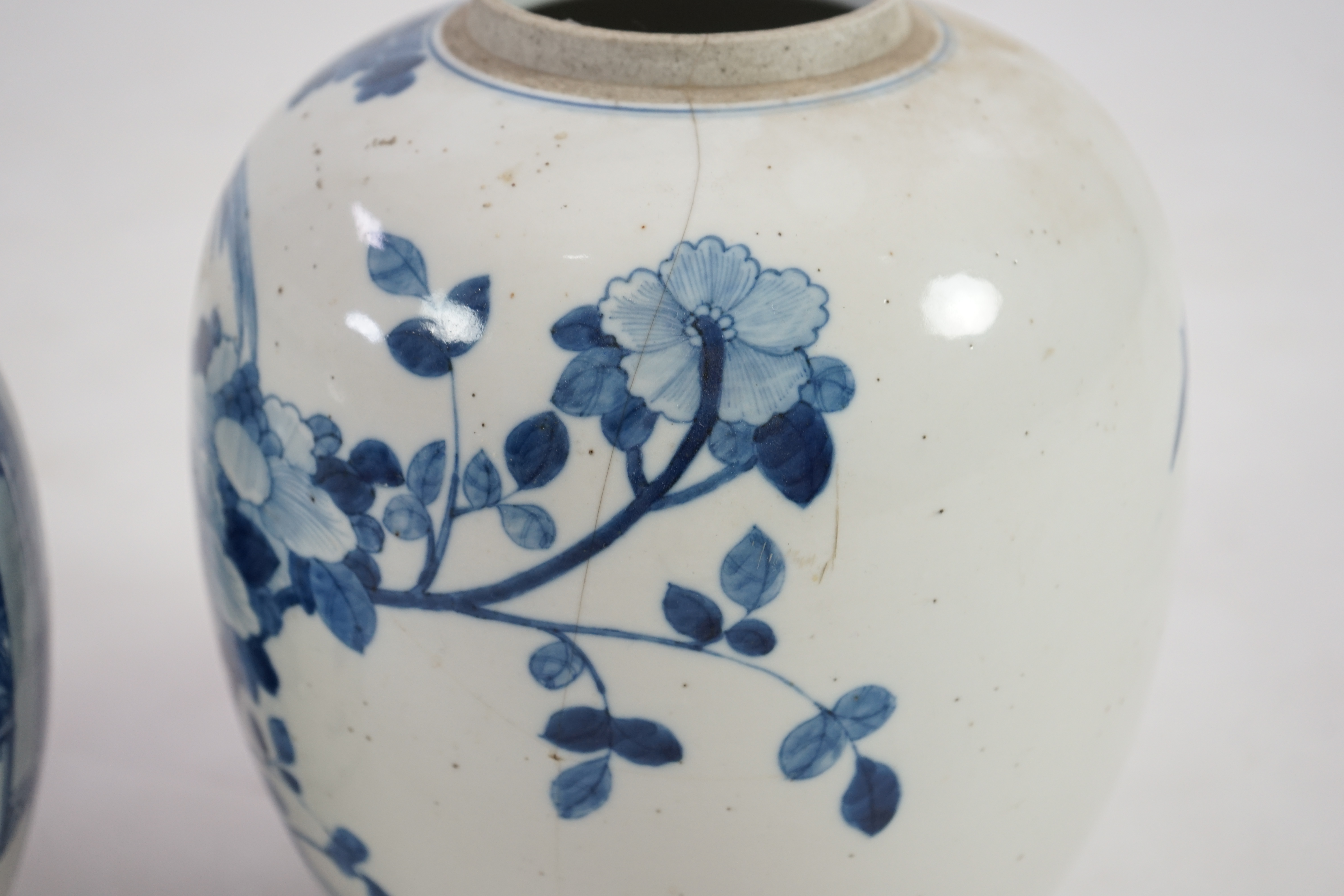 Two Chinese blue and white ovoid jars, one with associated cover, 19th century